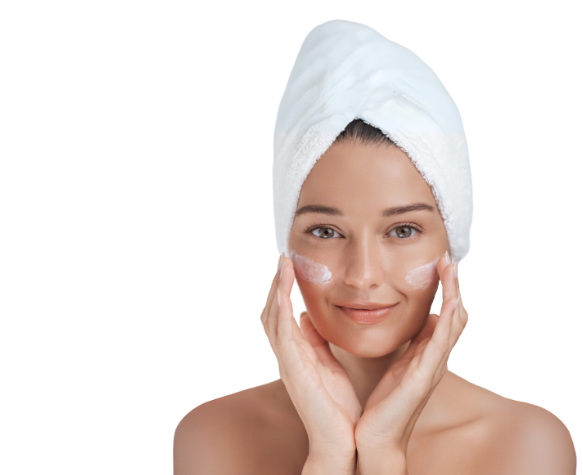 A woman applying skin cream
